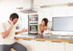 Husband in Kitchen on Cell Phone