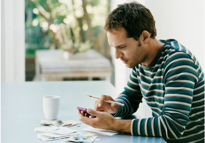 Man Using Calculator
