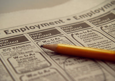 Help Wanted Ads Circled on Newspaper Help Wanted Ads Circled on Newspaper