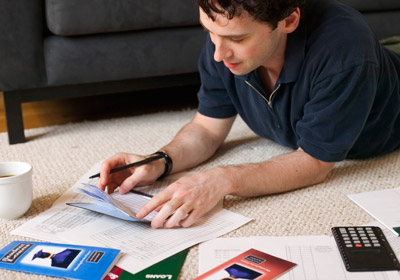 Man Planning Student Loans Man Planning Student Loans
