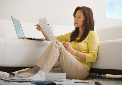 Woman Paying Bills