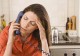 Distressed Woman on Phone
