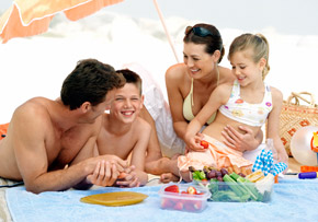 Family Having Lunch on the Beach