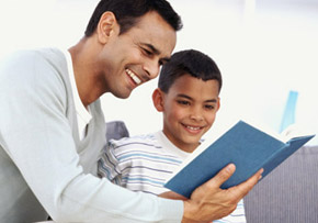 Man Reading to Child Man Reading to Child