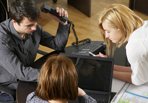Young People With Laptop and Phone