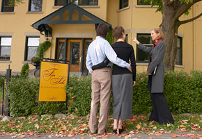 Realtor Showing House to Couple